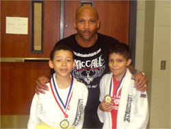 Professor Darren McCall of McCall Mixed Martial Arts with students